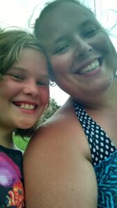 My dearest AFAB kiddo and I at the beach